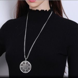 Long necklace with Lucky Sun Pendant.